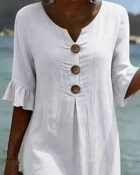 Vanesa | Linen dress with texture, puff sleeves, and buttons